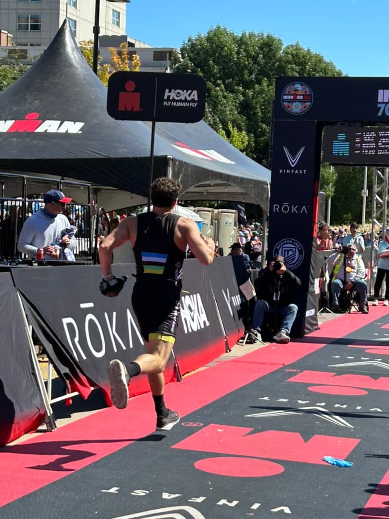 Running into 70.3 finish arch