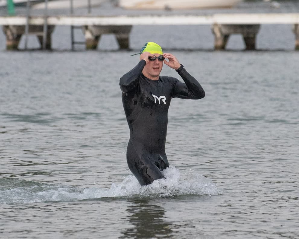 Pulling goggles off exiting swim